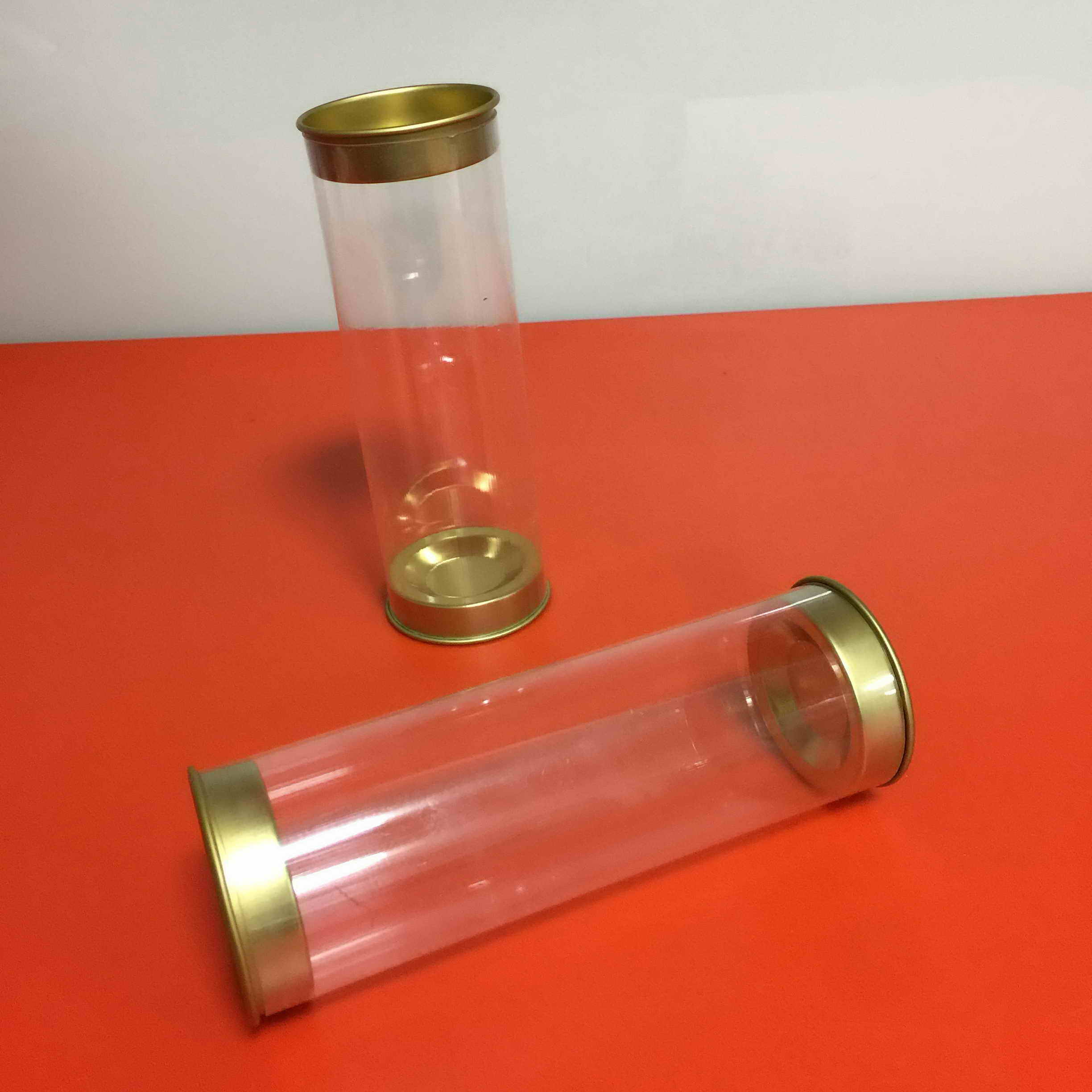 Clear plastic tubes with lids